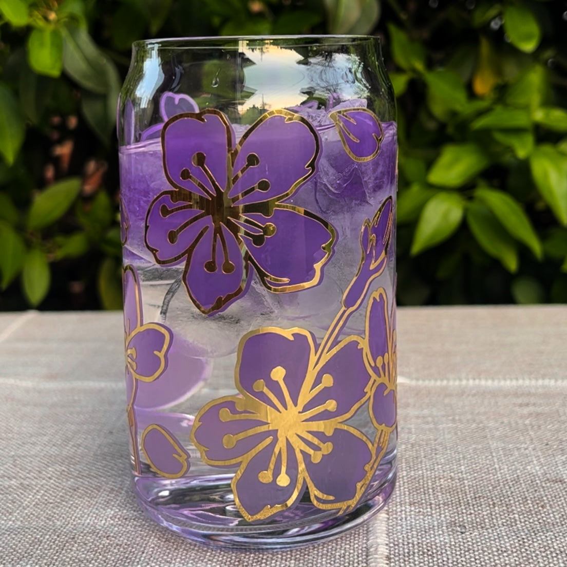 https://dbohomama.com/cdn/shop/products/purple_cherry_blossom_beer_can_glass_color_changing_cup.jpg?v=1680533821